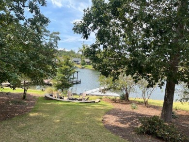 Experience the pinnacle of lakefront luxury in this stunning on The Patriot Golf Club At Grand Harbor in South Carolina - for sale on GolfHomes.com, golf home, golf lot