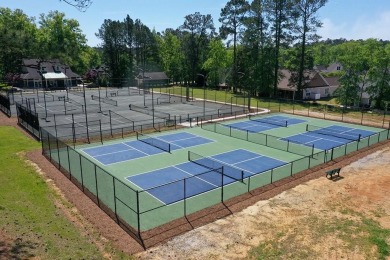 Experience the pinnacle of lakefront luxury in this stunning on The Patriot Golf Club At Grand Harbor in South Carolina - for sale on GolfHomes.com, golf home, golf lot