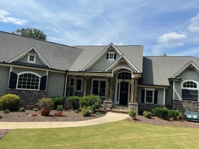 Experience the pinnacle of lakefront luxury in this stunning on The Patriot Golf Club At Grand Harbor in South Carolina - for sale on GolfHomes.com, golf home, golf lot
