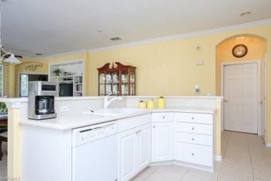 Spacious and bright end unit with 3 bedrooms and 2 bathrooms and on Naples Lakes Country Club in Florida - for sale on GolfHomes.com, golf home, golf lot