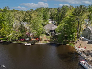 Priced to Sell! Stunning Waterfront Home on Rare Double Lot in on River Golf and Country Club at Lake Royale in North Carolina - for sale on GolfHomes.com, golf home, golf lot