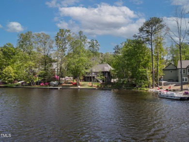 Priced to Sell! Stunning Waterfront Home on Rare Double Lot in on River Golf and Country Club at Lake Royale in North Carolina - for sale on GolfHomes.com, golf home, golf lot
