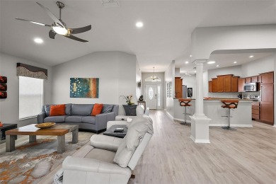 This STUNNING, TOP SELLING BEGONIA DESIGNER MODEL, offering a on Evans Prairie Golf and Country Club in Florida - for sale on GolfHomes.com, golf home, golf lot