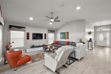 This STUNNING, TOP SELLING BEGONIA DESIGNER MODEL, offering a on Evans Prairie Golf and Country Club in Florida - for sale on GolfHomes.com, golf home, golf lot