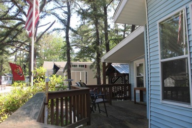 This 2 bedroom 1.5 bath Chariot Eagle Park Model with attached on Indian Mound Golf Club in New Hampshire - for sale on GolfHomes.com, golf home, golf lot