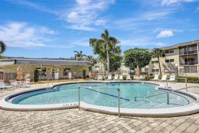 Beautiful and fully furnished 2-bedroom unit on the first floor on  in Florida - for sale on GolfHomes.com, golf home, golf lot
