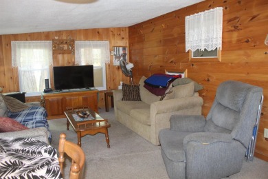 This 2 bedroom 1.5 bath Chariot Eagle Park Model with attached on Indian Mound Golf Club in New Hampshire - for sale on GolfHomes.com, golf home, golf lot