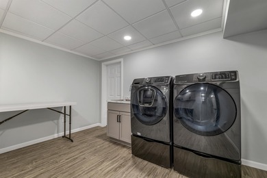 Welcome to this stunning end-unit townhome in the highly on Sky Meadow Country Club in New Hampshire - for sale on GolfHomes.com, golf home, golf lot