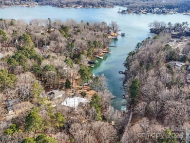 Lakefront Living in Tega Cay - With Private Dock  Wrap-Around on Tega Cay Golf Club in South Carolina - for sale on GolfHomes.com, golf home, golf lot