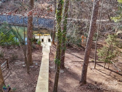 Lakefront Living in Tega Cay - With Private Dock  Wrap-Around on Tega Cay Golf Club in South Carolina - for sale on GolfHomes.com, golf home, golf lot