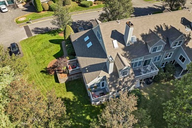 Welcome to this stunning end-unit townhome in the highly on Sky Meadow Country Club in New Hampshire - for sale on GolfHomes.com, golf home, golf lot