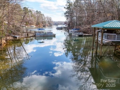 Lakefront Living in Tega Cay - With Private Dock  Wrap-Around on Tega Cay Golf Club in South Carolina - for sale on GolfHomes.com, golf home, golf lot