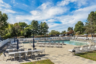 Welcome to this stunning end-unit townhome in the highly on Sky Meadow Country Club in New Hampshire - for sale on GolfHomes.com, golf home, golf lot