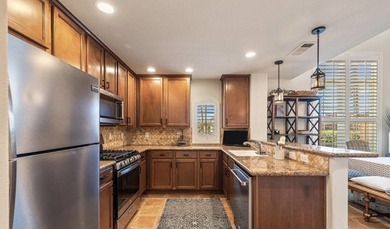 Behind the gates of beautiful Codorniz, this pristine 2-bedroom on The Hideaway Golf Club in California - for sale on GolfHomes.com, golf home, golf lot