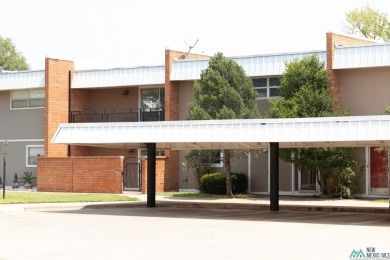 This well-maintained townhome boasts beautiful views of the golf on Chaparral Country Club in New Mexico - for sale on GolfHomes.com, golf home, golf lot