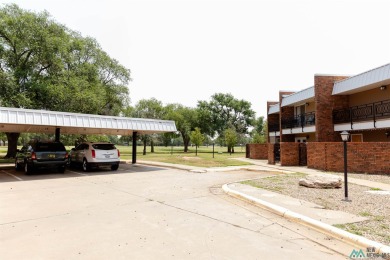 This well-maintained townhome boasts beautiful views of the golf on Chaparral Country Club in New Mexico - for sale on GolfHomes.com, golf home, golf lot