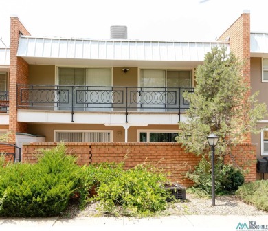 This well-maintained townhome boasts beautiful views of the golf on Chaparral Country Club in New Mexico - for sale on GolfHomes.com, golf home, golf lot