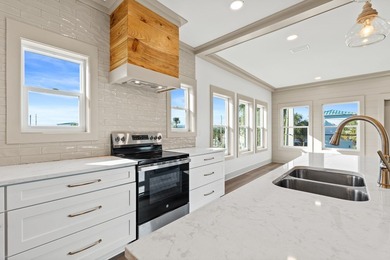 Welcome to 108 N 32nd St, a brand-new 4BR/3BA home perfectly on  in Florida - for sale on GolfHomes.com, golf home, golf lot