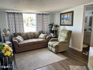 This is a beautifully 1993 updated unit (2019) that's located on on Fountain of the Sun Country Club in Arizona - for sale on GolfHomes.com, golf home, golf lot