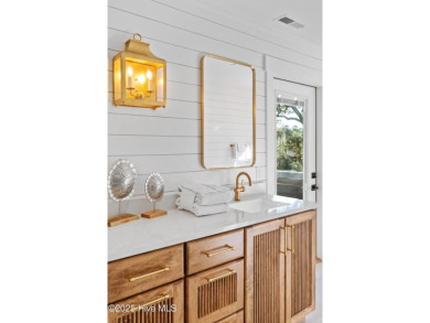 Nestled within the tranquil embrace of the Maritime Forest, this on Bald Head Island Golf Club in North Carolina - for sale on GolfHomes.com, golf home, golf lot