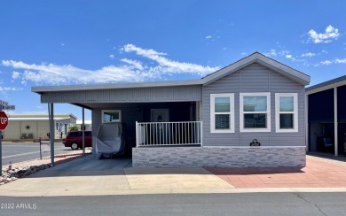 This is a beautifully 1993 updated unit (2019) that's located on on Fountain of the Sun Country Club in Arizona - for sale on GolfHomes.com, golf home, golf lot