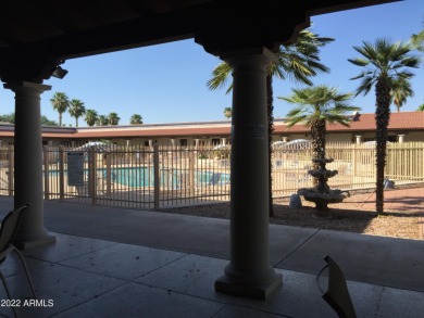 This is a beautifully 1993 updated unit (2019) that's located on on Fountain of the Sun Country Club in Arizona - for sale on GolfHomes.com, golf home, golf lot