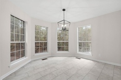 Welcome to this beautifully updated 4 bed, 3 bath home in the on Lake Forest Yacht and Country Club in Alabama - for sale on GolfHomes.com, golf home, golf lot