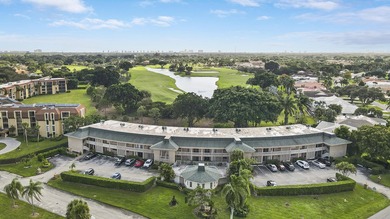 Spacious and stylish, this 2 bed/2 bath first-floor condo is on BallenIsles Golf and Country Club in Florida - for sale on GolfHomes.com, golf home, golf lot