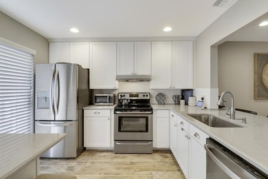 Spacious and stylish, this 2 bed/2 bath first-floor condo is on BallenIsles Golf and Country Club in Florida - for sale on GolfHomes.com, golf home, golf lot