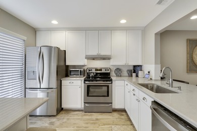 Spacious and stylish, this 2 bed/2 bath first-floor condo is on BallenIsles Golf and Country Club in Florida - for sale on GolfHomes.com, golf home, golf lot