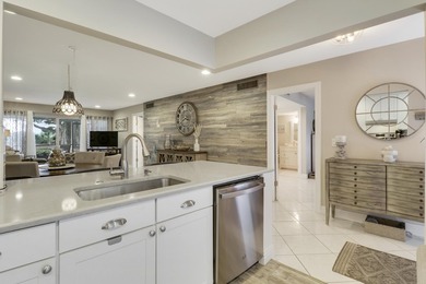 Spacious and stylish, this 2 bed/2 bath first-floor condo is on BallenIsles Golf and Country Club in Florida - for sale on GolfHomes.com, golf home, golf lot