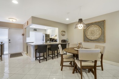 Spacious and stylish, this 2 bed/2 bath first-floor condo is on BallenIsles Golf and Country Club in Florida - for sale on GolfHomes.com, golf home, golf lot