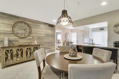 Spacious and stylish, this 2 bed/2 bath first-floor condo is on BallenIsles Golf and Country Club in Florida - for sale on GolfHomes.com, golf home, golf lot