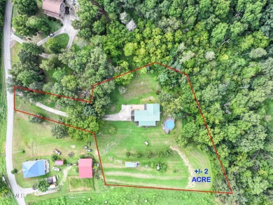 Welcome to 425 Lick Hollow Road, a property that blends country on Link Hills Country Club in Tennessee - for sale on GolfHomes.com, golf home, golf lot