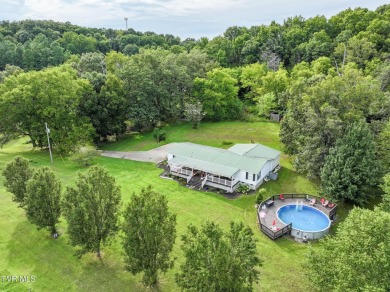 Welcome to 425 Lick Hollow Road, a property that blends country on Link Hills Country Club in Tennessee - for sale on GolfHomes.com, golf home, golf lot