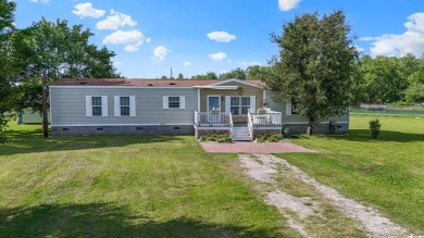 Welcome to your private retreat in the heart of Little River on Eagle Nest Golf Club in South Carolina - for sale on GolfHomes.com, golf home, golf lot