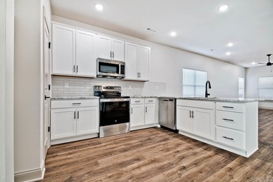 Experience effortless living in these brand-new patio homes on Big Creek Golf and Country Club in Arkansas - for sale on GolfHomes.com, golf home, golf lot