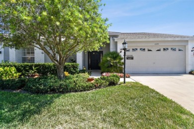 In the delightful Heritage Pines community for individuals aged on Heritage Pines Country Club in Florida - for sale on GolfHomes.com, golf home, golf lot