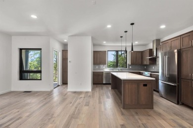 This chic and stylish architecturally designed Townhouse boasts on Whitefish Lake Golf Club in Montana - for sale on GolfHomes.com, golf home, golf lot