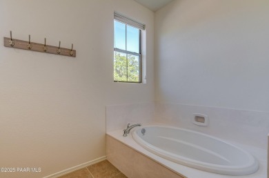 This beautifully maintained Stoneridge Monterra Plan home is on StoneRidge Golf Course in Arizona - for sale on GolfHomes.com, golf home, golf lot