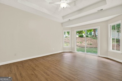 Welcome to this beautifully updated 3-bedroom, 2-bath stepless on Canongate At Eagle Watch Golf Club in Georgia - for sale on GolfHomes.com, golf home, golf lot