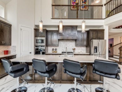 Experience refined living in this impeccably maintained home on The Tribute At the Colony in Texas - for sale on GolfHomes.com, golf home, golf lot