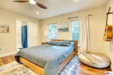 STUNNING RANCH RETREAT IN PRESTIGIOUS DOE VALLEY GATED COMMUNITY on Doe Valley Country Club in Kentucky - for sale on GolfHomes.com, golf home, golf lot