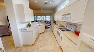 Welcome to this beautifully maintained 3-bedroom, 2-bath home on Seminole Lakes Country Club in Florida - for sale on GolfHomes.com, golf home, golf lot