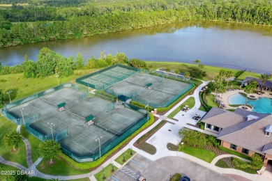 Nestled on a quiet, no-through street in Plantation Bay's on Plantation Bay Golf and Country Club in Florida - for sale on GolfHomes.com, golf home, golf lot
