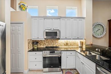 Tee up your Florida lifestyle at 8821 Champions Way in the on PGA Golf Club in PGA Village in Florida - for sale on GolfHomes.com, golf home, golf lot