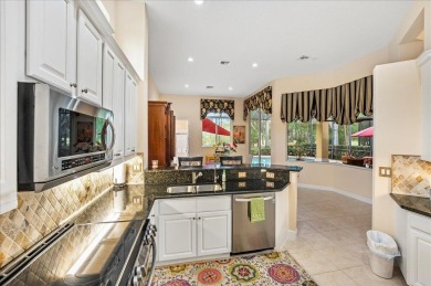Tee up your Florida lifestyle at 8821 Champions Way in the on PGA Golf Club in PGA Village in Florida - for sale on GolfHomes.com, golf home, golf lot