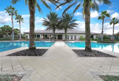 Nestled on a quiet, no-through street in Plantation Bay's on Plantation Bay Golf and Country Club in Florida - for sale on GolfHomes.com, golf home, golf lot