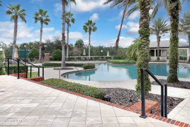 Nestled on a quiet, no-through street in Plantation Bay's on Plantation Bay Golf and Country Club in Florida - for sale on GolfHomes.com, golf home, golf lot