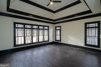 Welcome to this lovely home in Governors Towne Club. This on The Governors Towne Club in Georgia - for sale on GolfHomes.com, golf home, golf lot